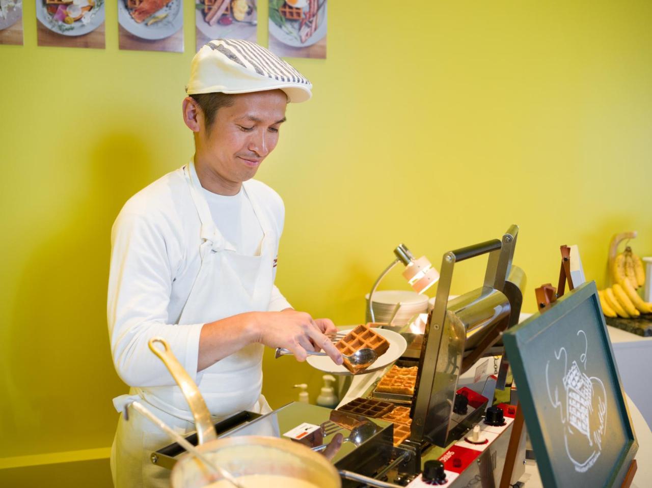 Omo7 Asahikawa By Hoshino Resorts Bagian luar foto A chef preparing Belgian waffles